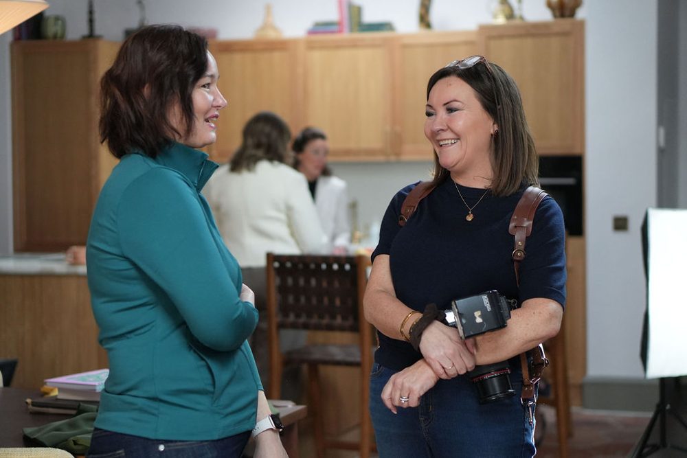Jacqui chatting with a client
